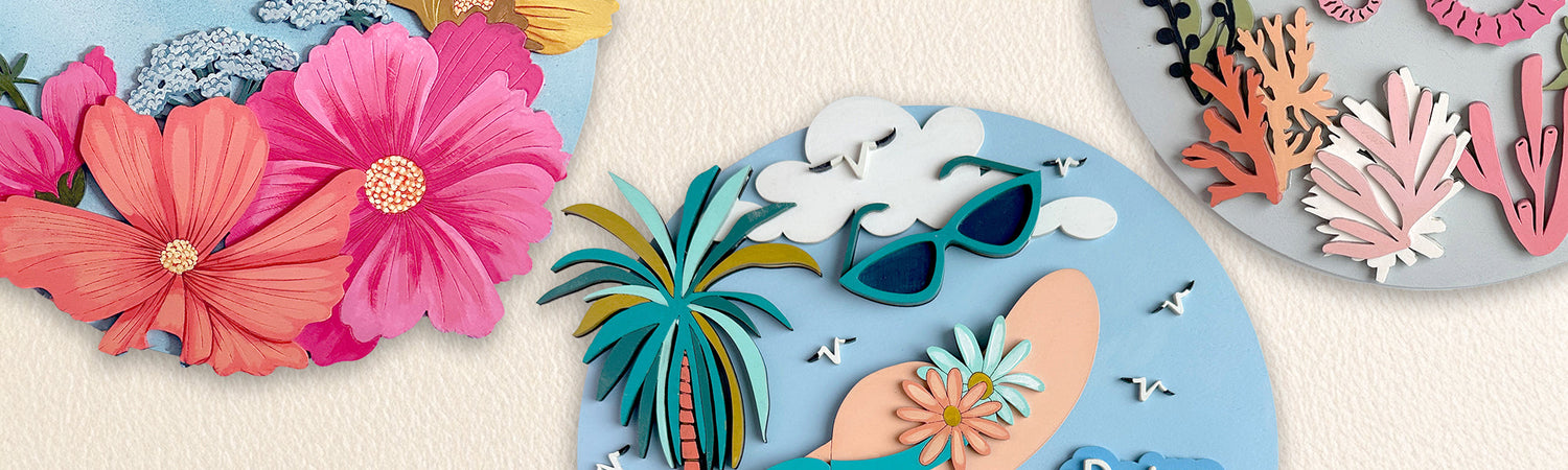 A round door hanger that is light blue with yellow, pink and coral flowers, a blue butterfly and the words Hello Spring.