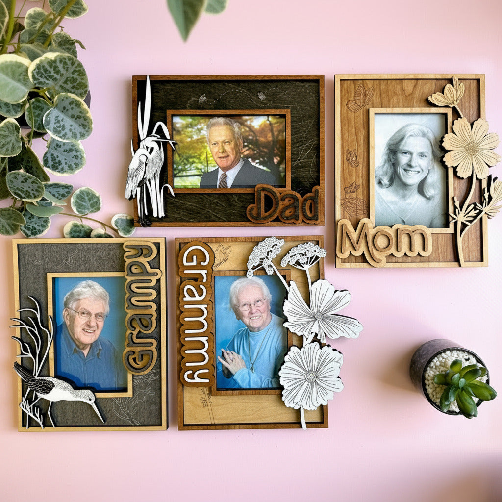 Set of family photo frames with 'Dad', 'Mom', 'Grandpa', and 'Grandma' text on a pink background.