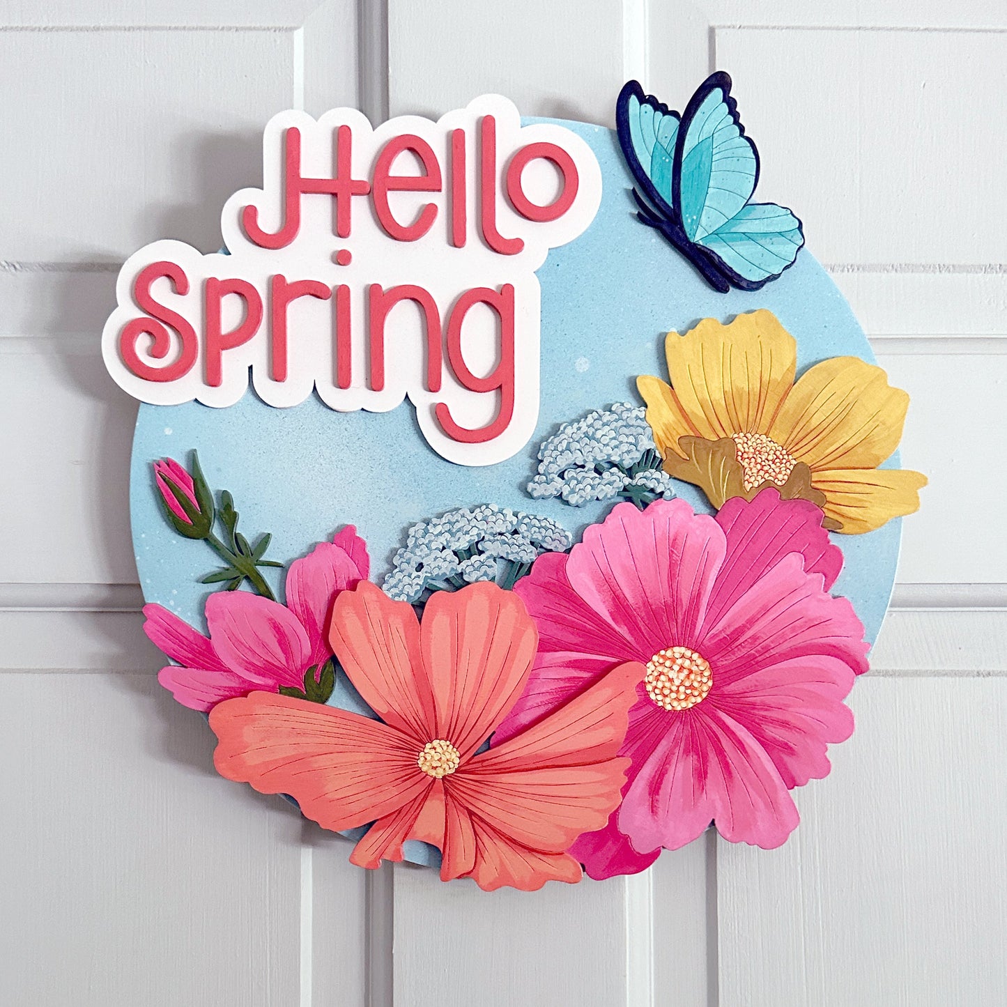 Decorative sign with colorful flowers and a butterfly on a white background
