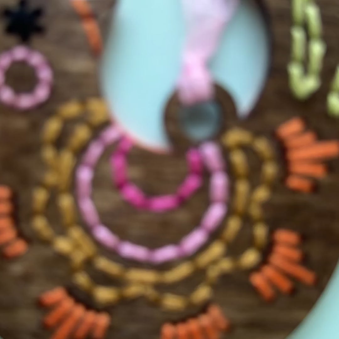 Scalloped folk bird embroidery ornament video