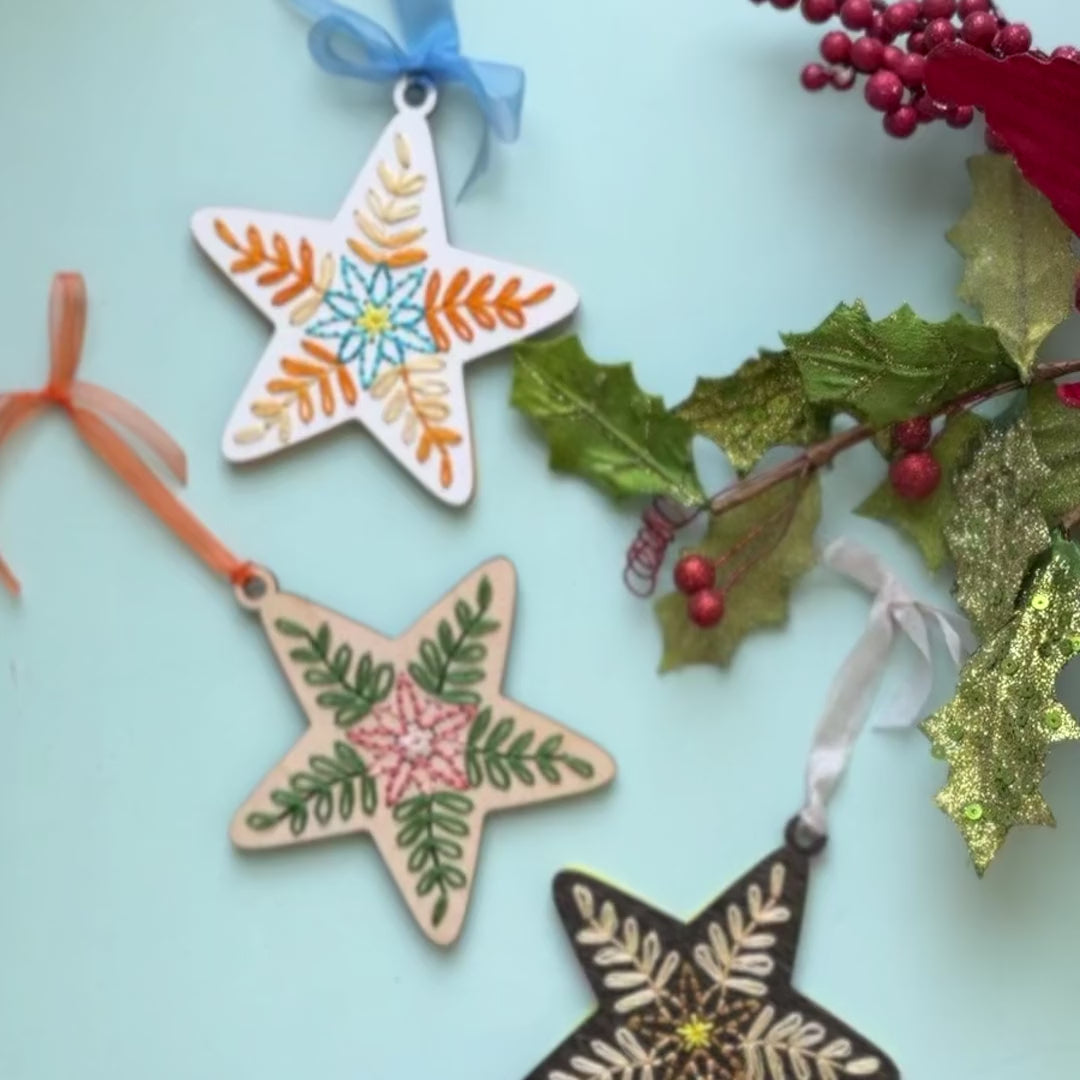 Close-up video of folk art star embroidery ornaments