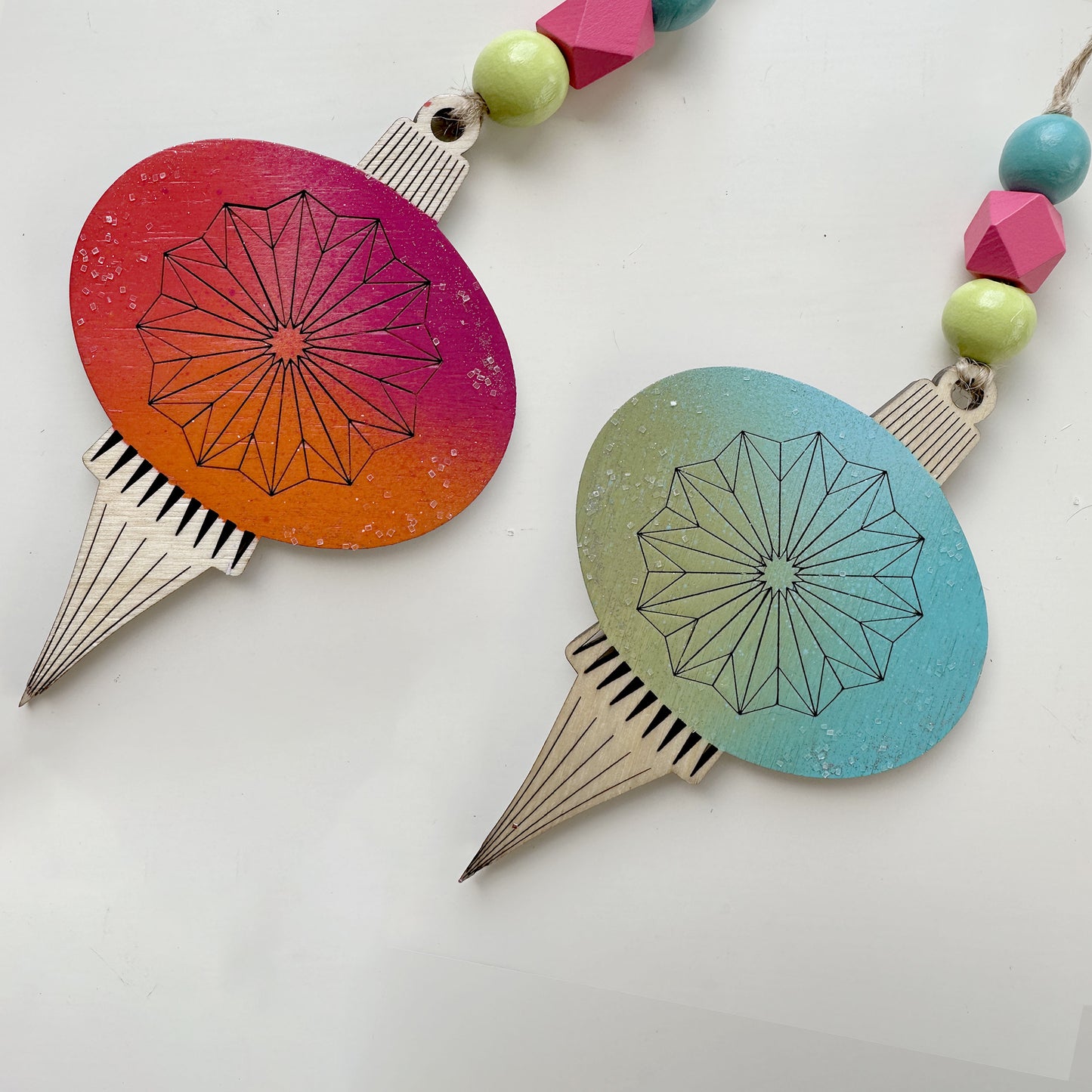 Decorative items with geometric designs on a white background
